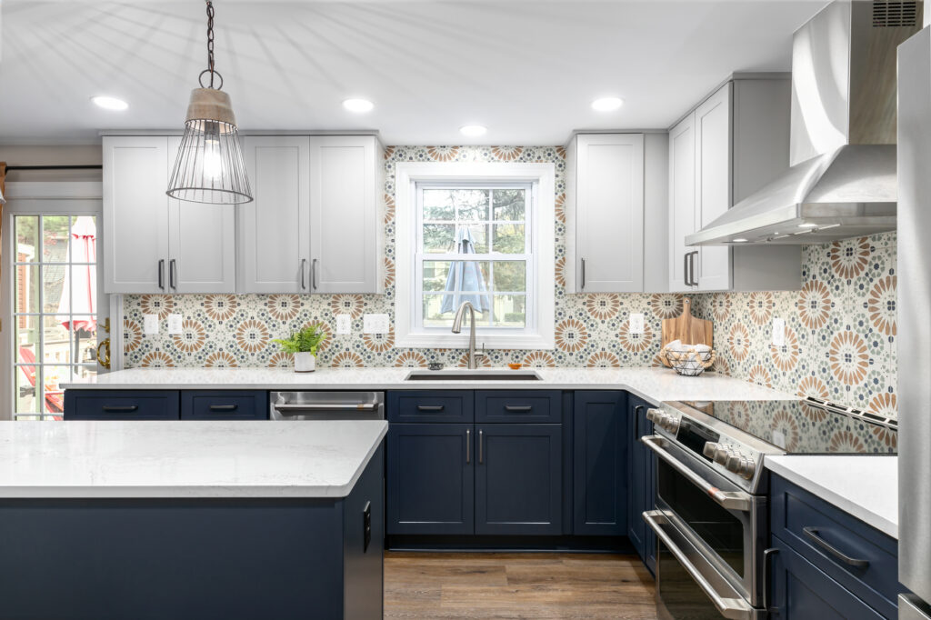 Wide-plank luxury vinyl flooring running from the kitchen into the dining area